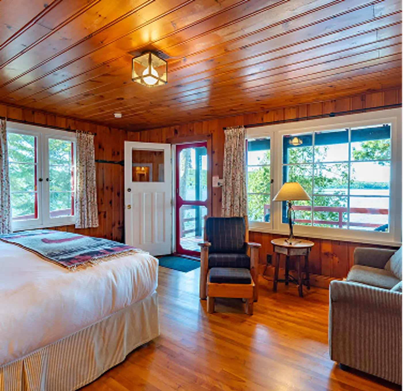 Interior cabin featuring handmade furniture and unique decor at Killarney Lodge in Algonquin Park.
