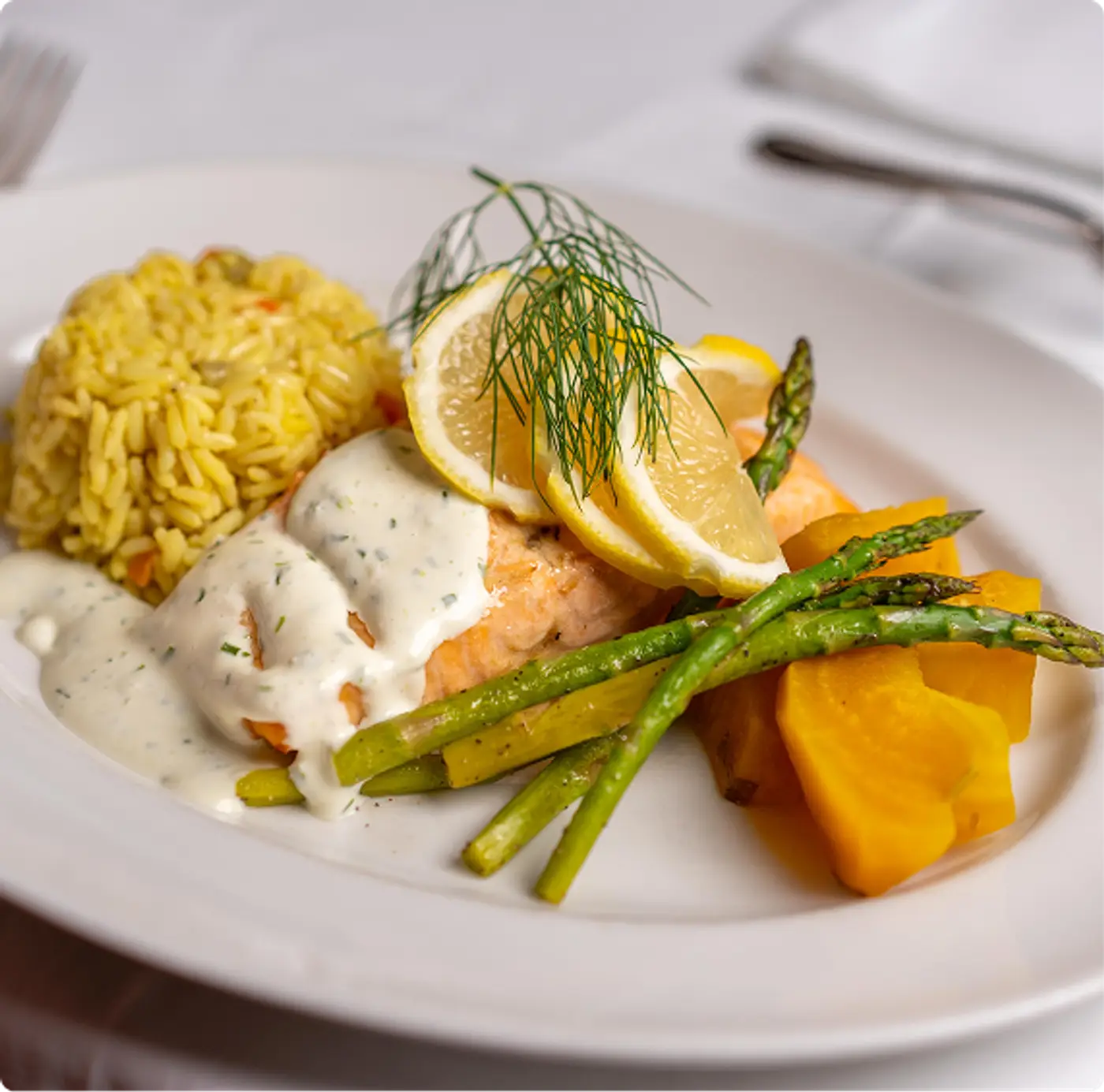 Fish, rice, asparagus and garnish ready to eat at Killarney Lodge in Algonquin Park.