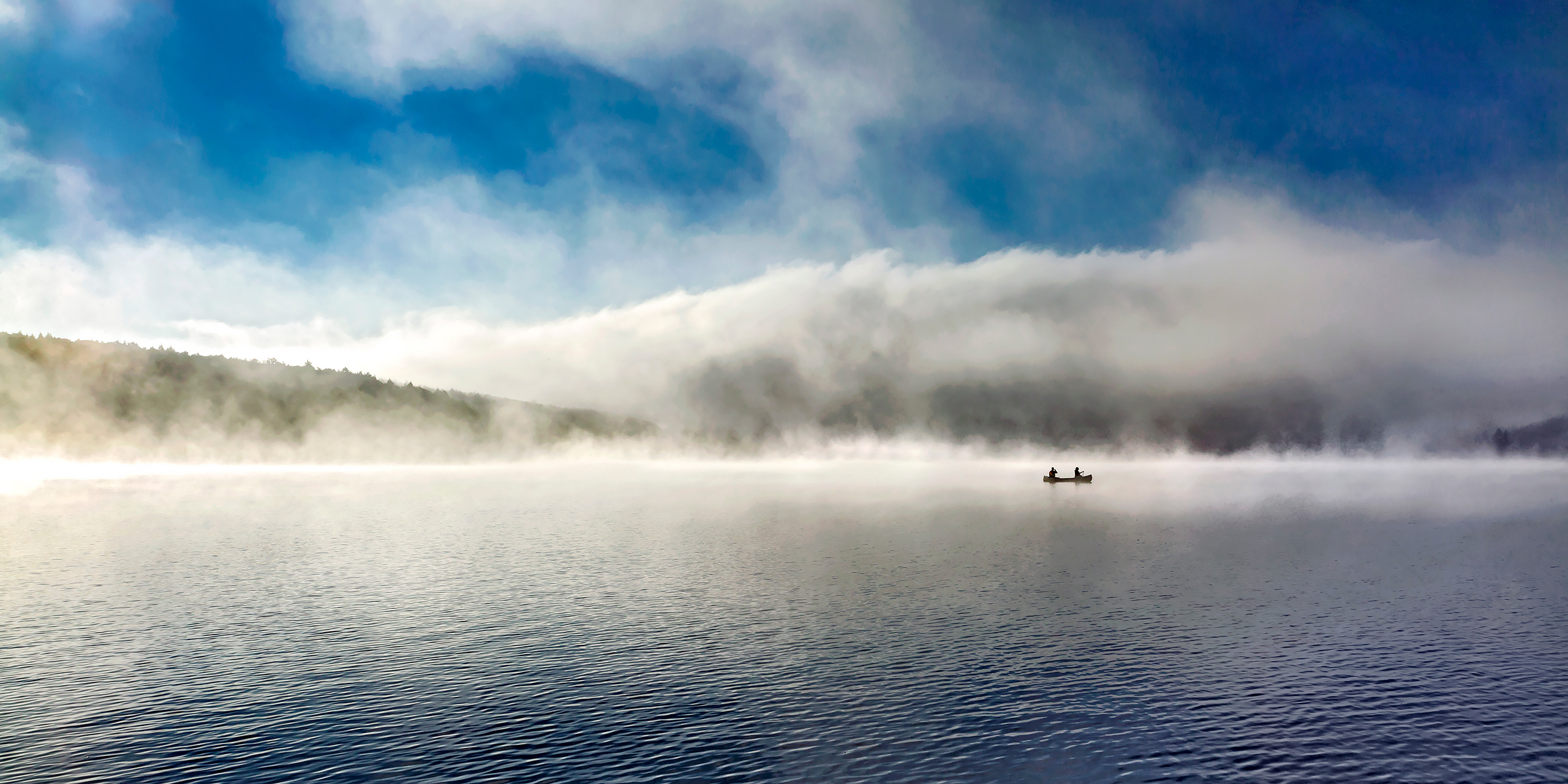 Dawn canoe paddle on the Lake of two Rivers