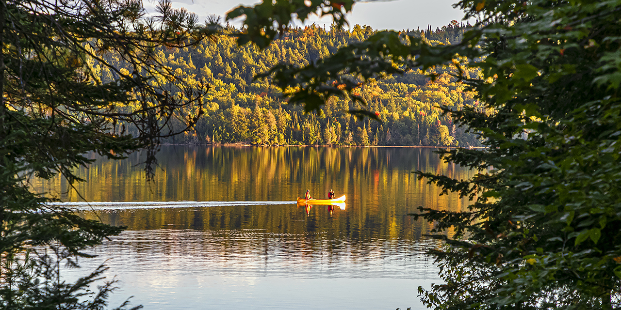 Sunset canoe paddle on Lake of Two Rivers on Algonquin Park